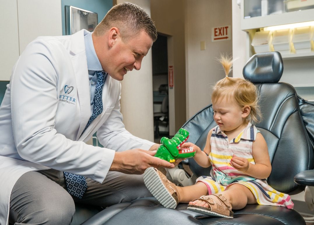 little girl in dentist chair pediatric dentistry fargo